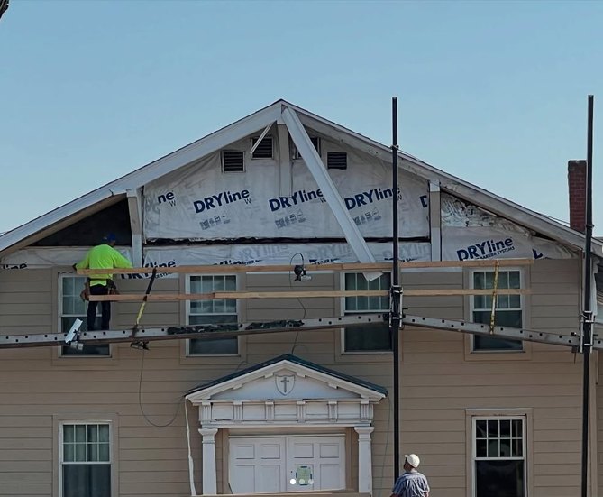 Historic building gable with new sheathing before paint